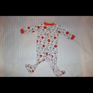 Baby pumpkin footy pajamas.